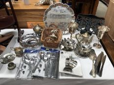 A box of assorted silver plate ware including teapots