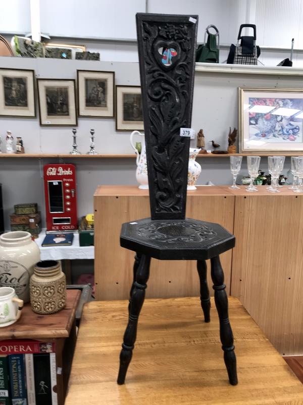 A carved oak spinning chair