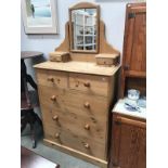 A 2 over 3 drawer pine dressing table
