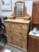 A 2 over 3 drawer pine dressing table