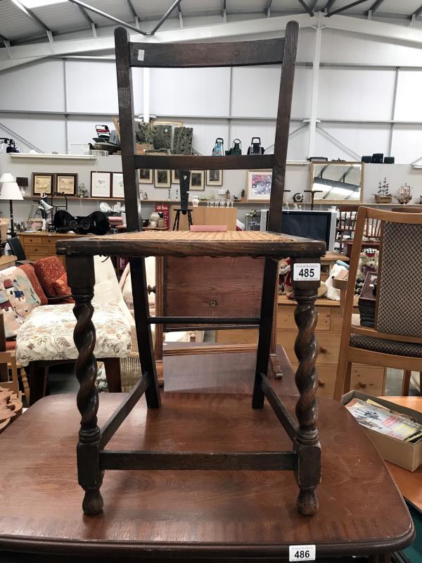 A cane seated bedroom chair