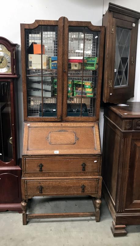 An oak bureau bookcase