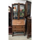 An oak bureau bookcase