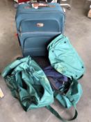 A suitcase, holdalls etc.