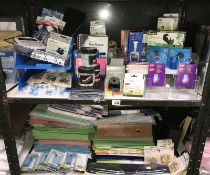 2 shelves of office supplies including files etc.