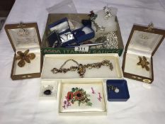 A mixed lot of costume jewellery including gold pendant