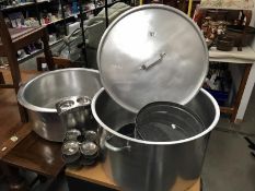 2 large stainless steel pans and 4 flour sieves