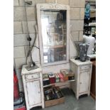 A shabby chic mirrored cabinet