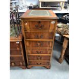 A wood effect 3 drawer filing cabinet