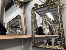 2 wall mirrors (1 with bevel edge) in gilt frames