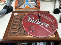 A copper plate inked map of Wales and a motto wall clock