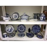 2 shelves of blue and white pottery