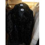 A faux fur coat.