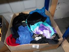 A box of assorted swimsuits etc.