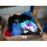 A box of assorted swimsuits etc.