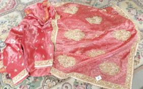 A superb quality Indian sari complete with top and decorated with gold thread.