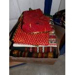 A box of assorted shawls etc.