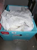 A box of assorted net curtains etc.