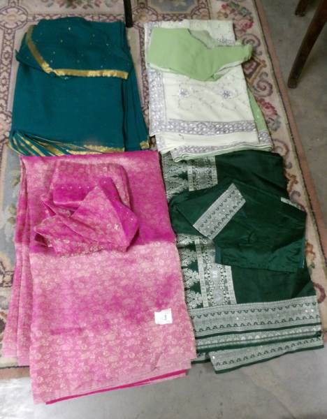 4 Indian sari's in complete with tops in various colours.