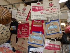 A large quantity of advertising shopping bags.