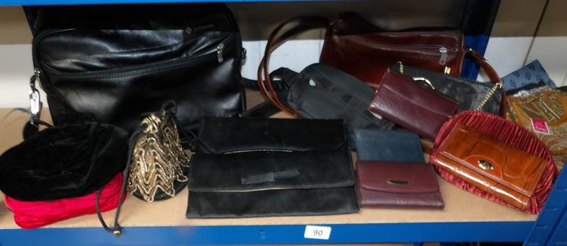 A shelf of assorted bags and purses.