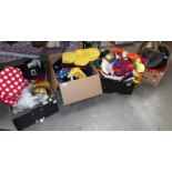 4 boxes of assorted fancy dress hats.