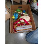 A box of percussion instruments etc.