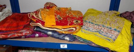 6 Indian sari's in various colours.