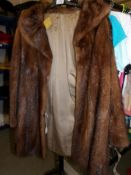 A vintage faux fur & faux leather coat.