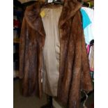 A vintage faux fur & faux leather coat.