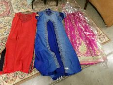 2 Indian tunics with trousers and an Indian skirt.