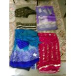 4 Indian sari's complete with tops in various colours.