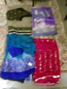 4 Indian sari's complete with tops in various colours.