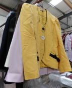 Approximately 14 ladies jackets in various styles and sizes.