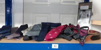 A mixed lot of ties, bow ties and belts.