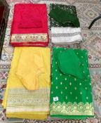 4 Indian sari's complete with tops in various colours.