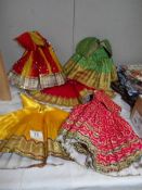 A quantity of Indian children's dresses.