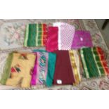 7 Indian sari's in various colours (no tops).