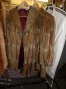 2 vintage fur coats.
