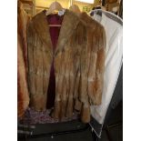 2 vintage fur coats.