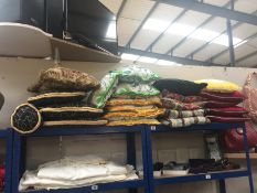 A quantity of assorted cushions.