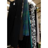 Approximately 23 ladies skirts in assorted styles and sizes.