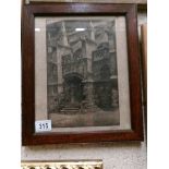 A 19th century framed and glazed engraving of a Gothic style building, signed but indistinct.