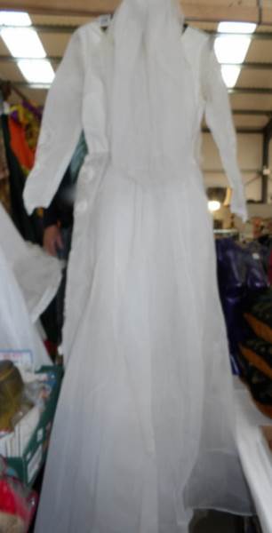 A vintage wedding gown with veil.