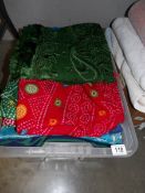 A large box of assorted sari's etc.