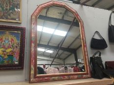 A wall mirror