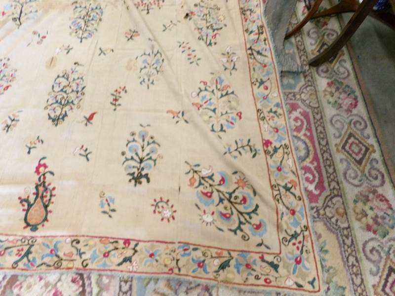 An antique embroidered bed cover, 230 x 160 cm (badly stained). - Image 2 of 7