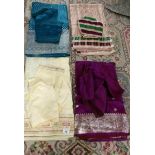 4 Indian sari's complete with tops in various colours.