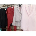 3 ladies skirt suits and a trouser suit.