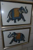 A pair of framed and glazed studies of elephants on silk.
